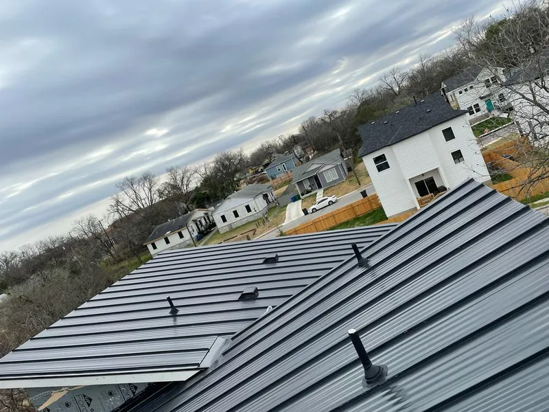 Standing seam metal roof panels with vents for Skylight Repair in Greer